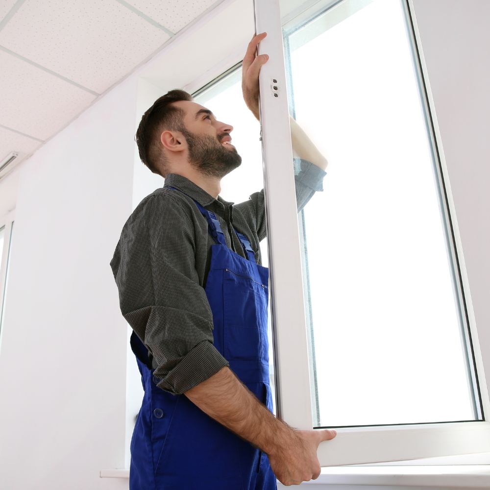 a person is installing a window